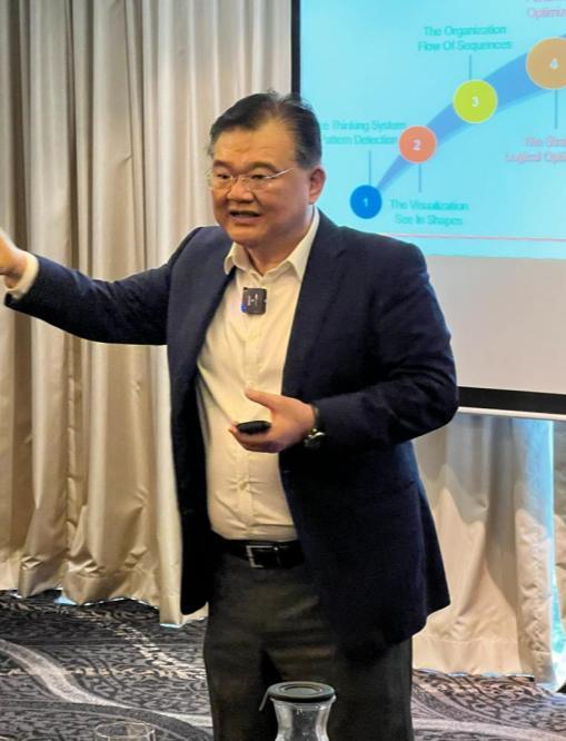 Dr Norman Tien speaking, from CurioMITY investor presentation